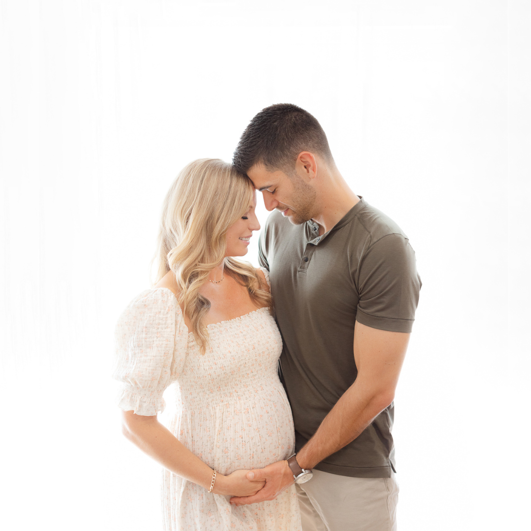 close up image of pregnant woman and her partner taken by boston maternity photographer