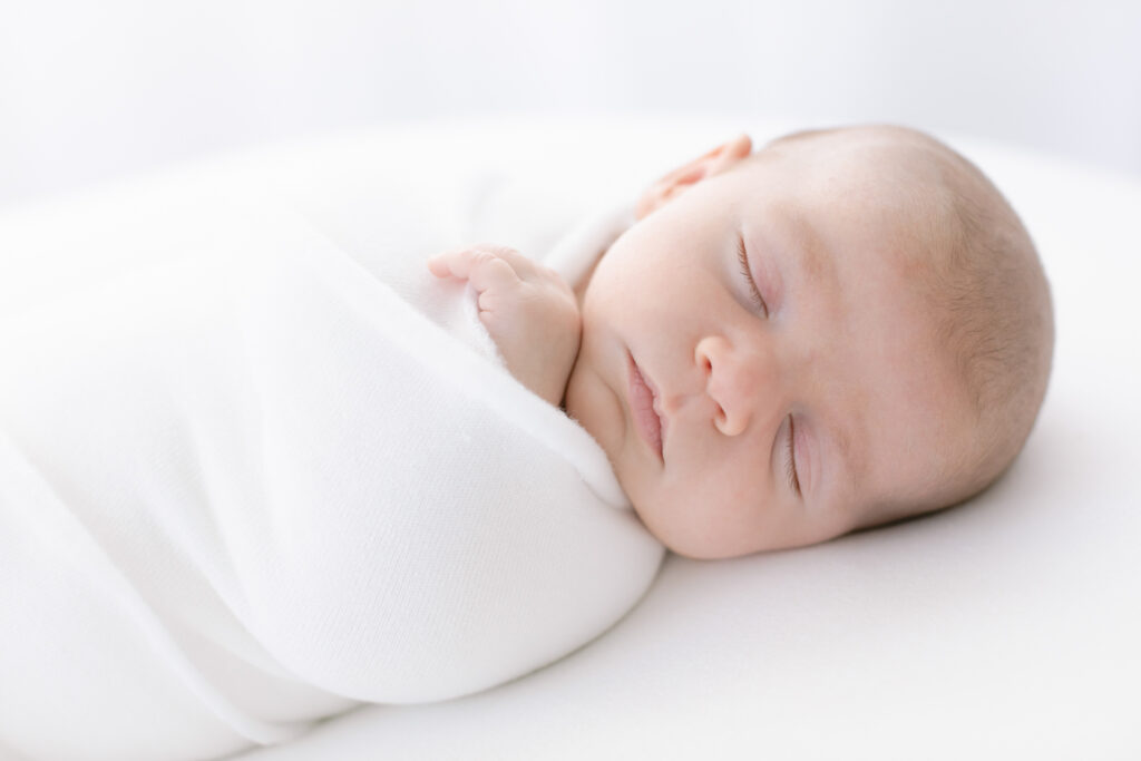photograph of newborn sleeping