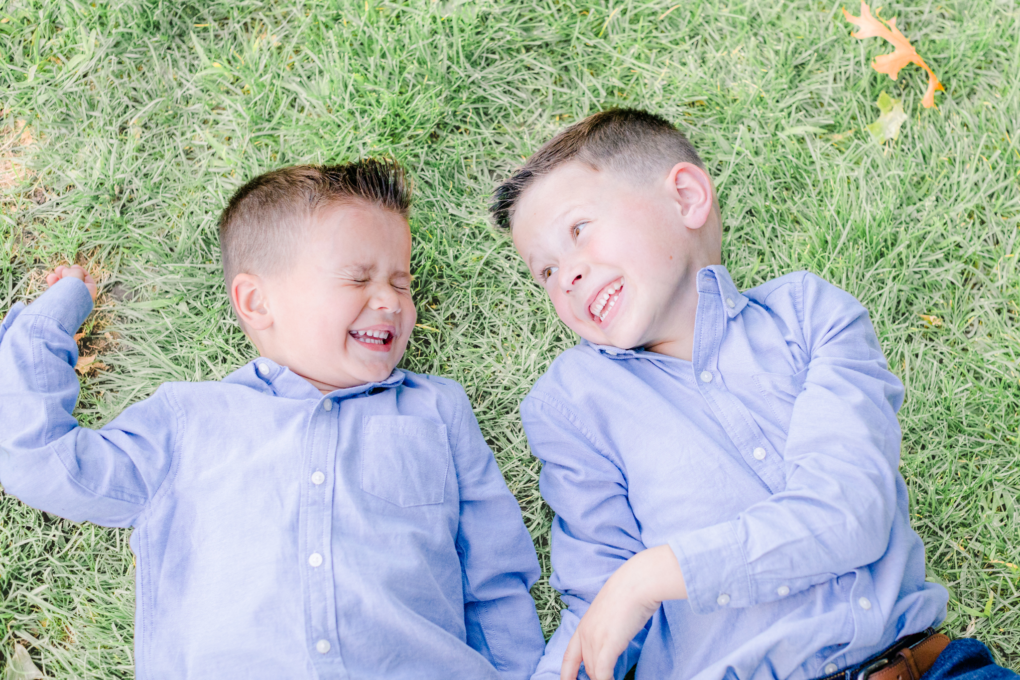 image of two brothers smiling at each other taken by boston family photographer